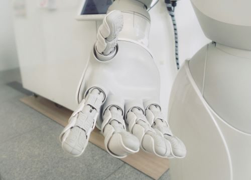 An AI robot hand reaching out.