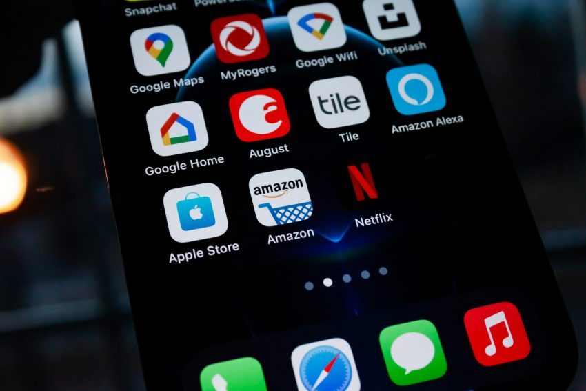 A close up view of the amazon app, among others on a smart phone.