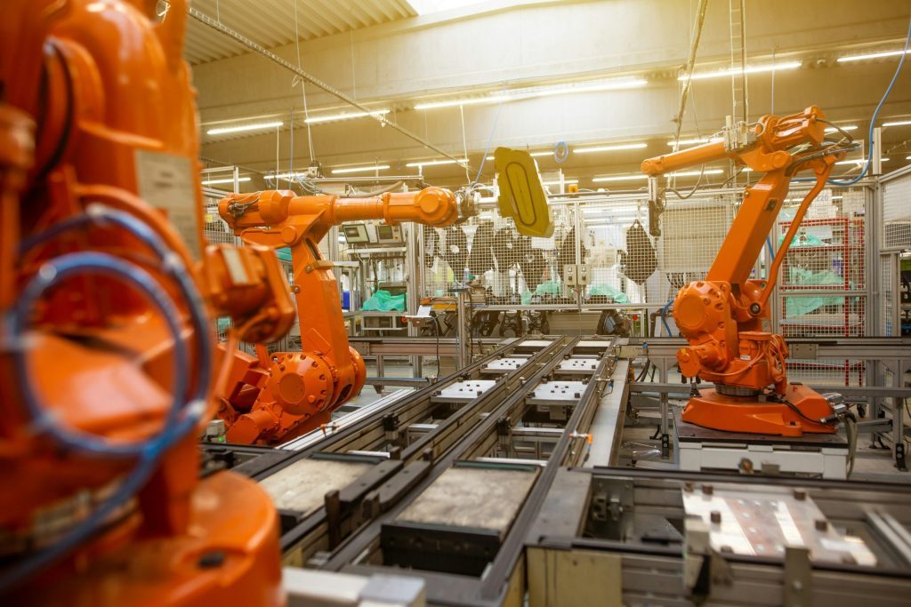 A collaborative robot operating in a factory.