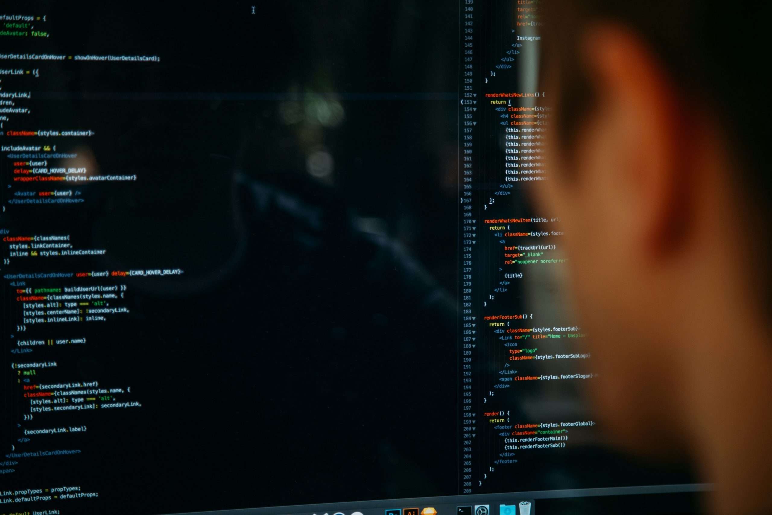 Data flashing up on a screen, watched by a worker.