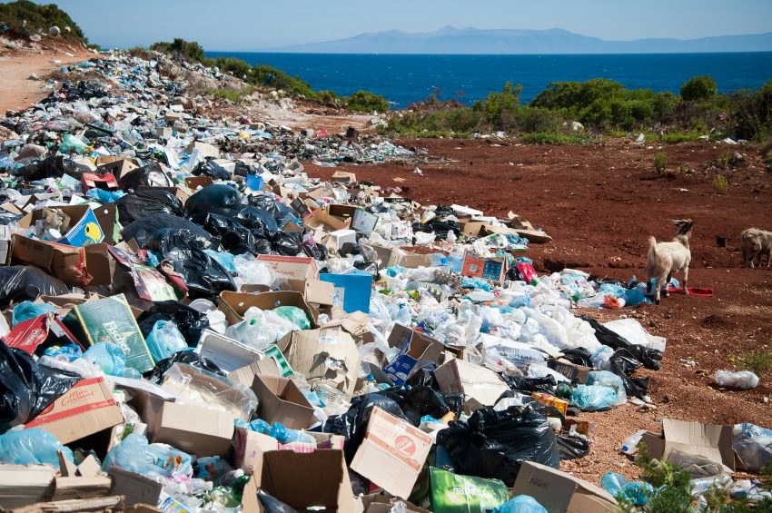 A landfill showing lots of plastic waste.