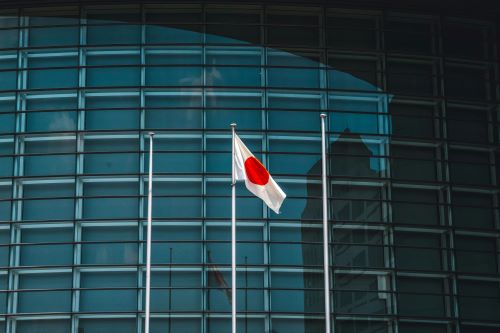 A flag flying outside the Japanese government building.