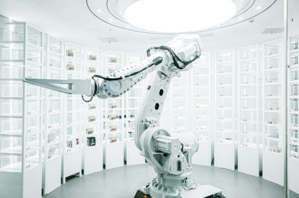 A robotic arm operating in a factory.