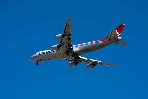 A cargo plane mid flight.