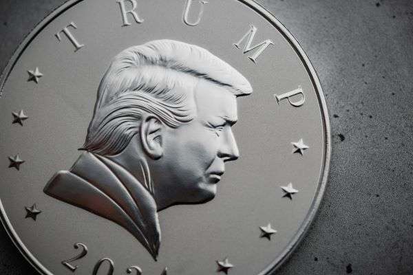 Trump's face on the side of an American coin with 2024.