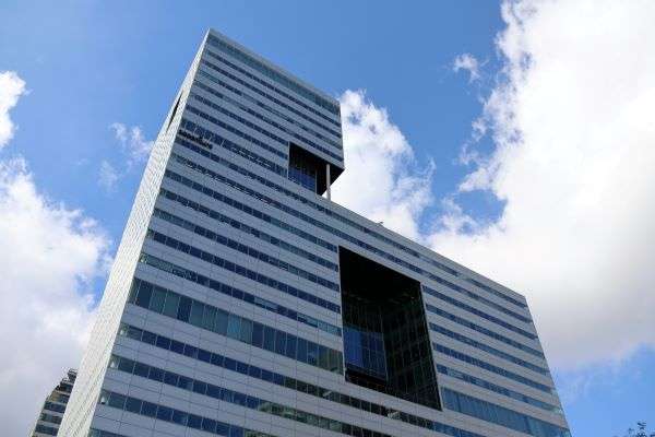 An image of an Accenture building seen against a blue sky.