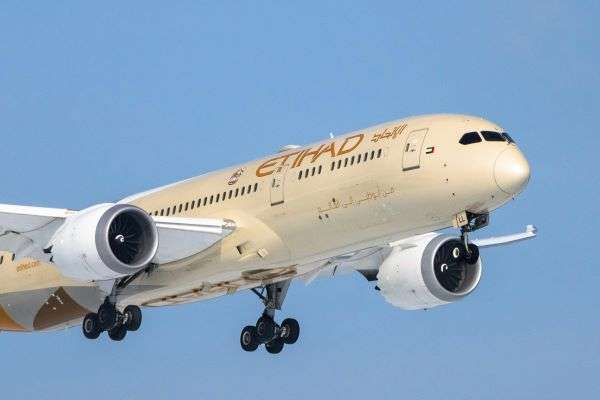 An Etihad plane taking off.