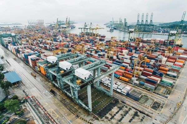 An image of a congested and busy shipping port seen from the inside.