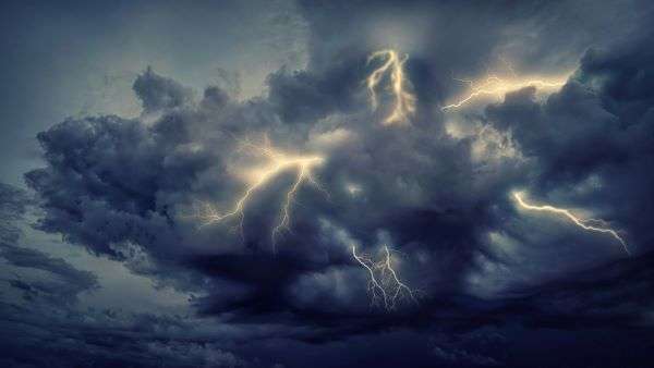 Lightening coming from clouds during a storm.