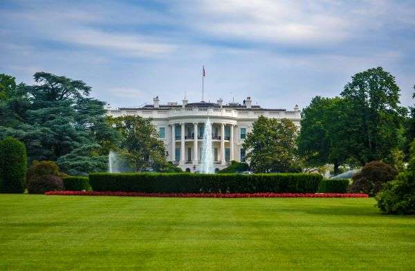 A view of the white house on a cloudy day.