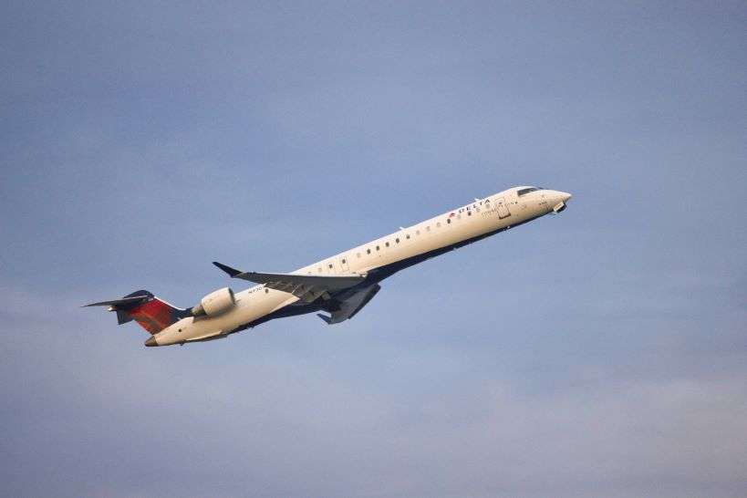 A Delta Airlines plane taking off.