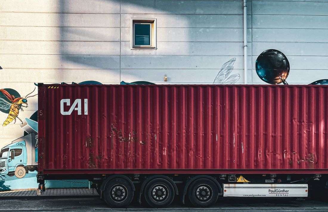 A container on a lorry. The average global transit time has risen by five days YoY.