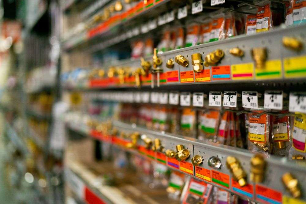 Shelves of hardware inside a Fastenal's store.