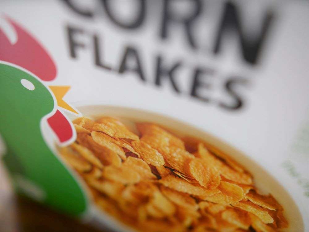 Close up of Kellogg's cornflakes box.