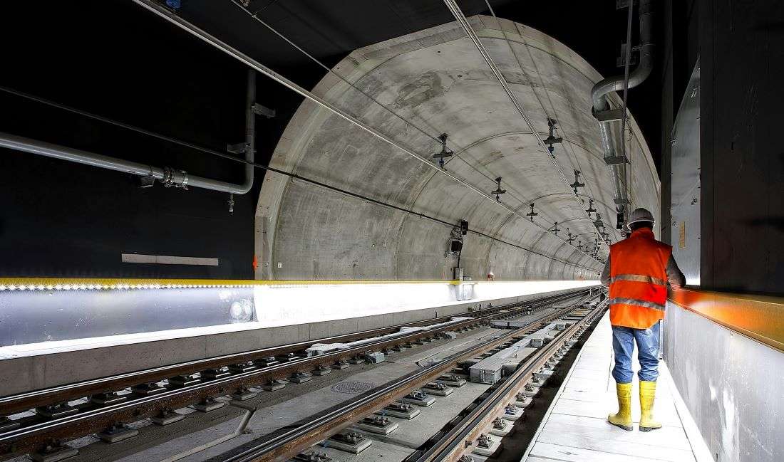 A rail worker in orange vest. The North American supply chain is on the brink of a labor crisis.