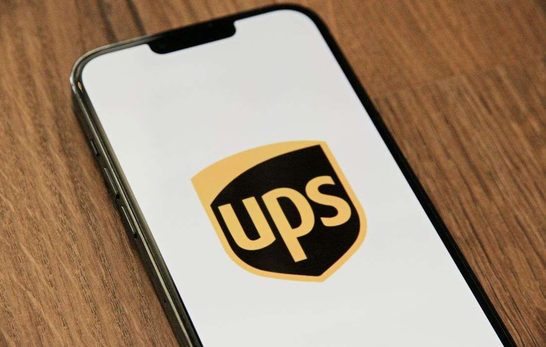 The UPS logo on a smartphone.