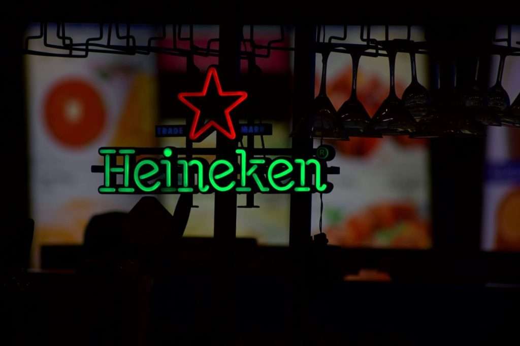 Heineken uses AI to optimize operations, reduce emissions, and achieve net-zero sustainability goals.