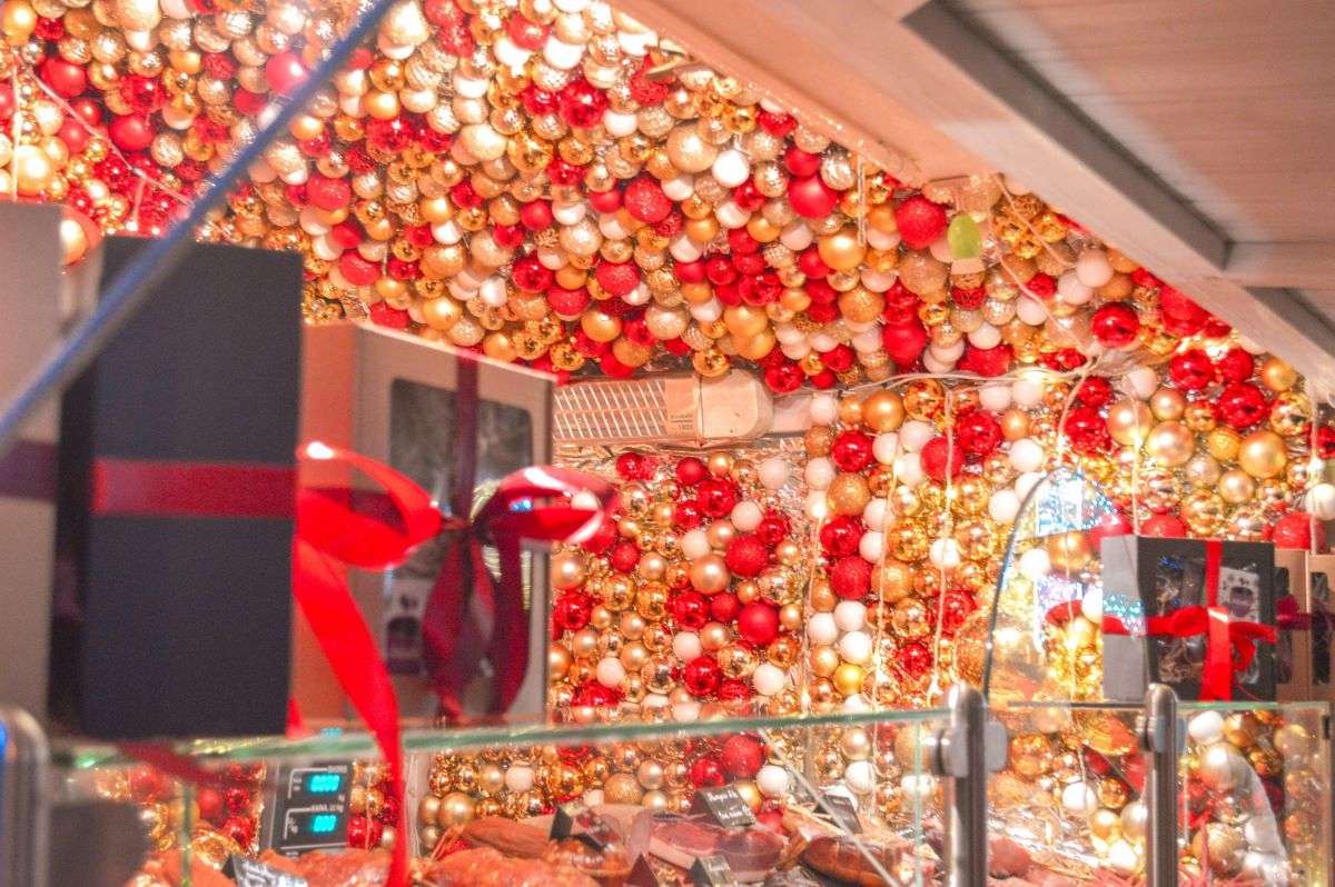 Shop decorated for Christmas. UK retailers adjust stocking strategies due to the Red Sea crisis, facing increased shipping costs and potential disruptions during the crucial pre-Christmas period.