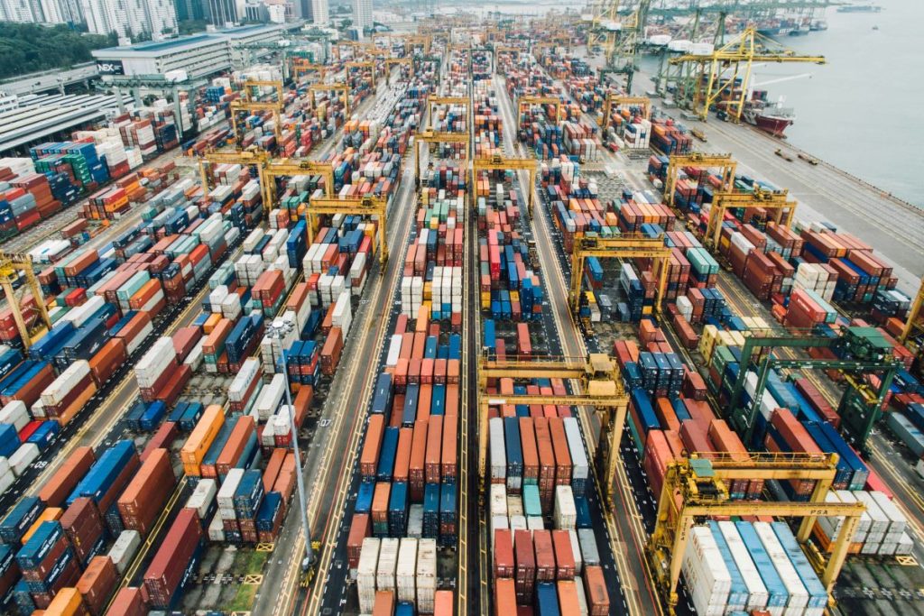 Retailers rush imports to offset potential port strikes and tariffs, boosting container volumes nationwide.