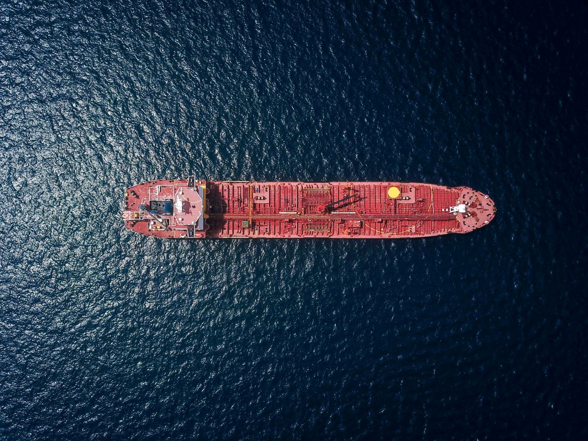 Shipping containers at a port, symbolizing U.S.-China trade disruptions and rising logistics costs.